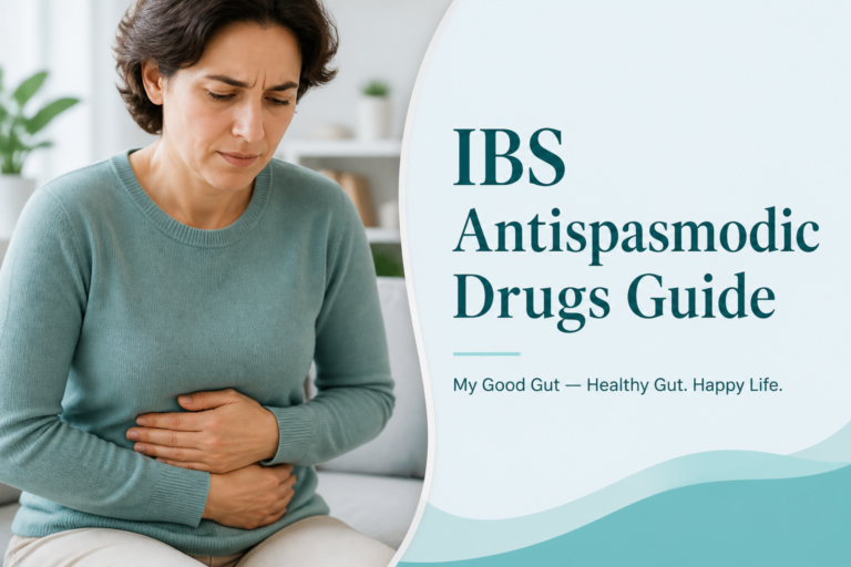 A woman in a light blue sweater sits on a couch, holding her stomach in discomfort. Next to her, text reads: "IBS Antispasmodic Drugs Guide. My Good Gut — Healthy Gut. Happy Life." Explore our guide for IBS relief.