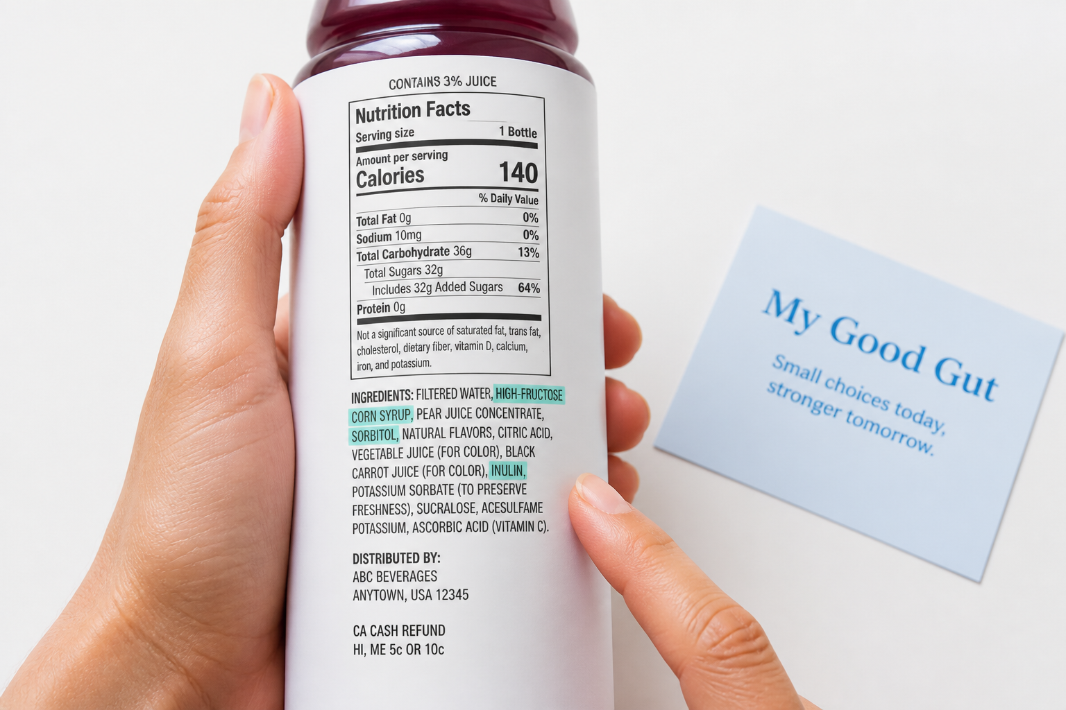 Hand pointing to drink label highlighting sorbitol, high-fructose corn syrup, inulin as IBS triggers