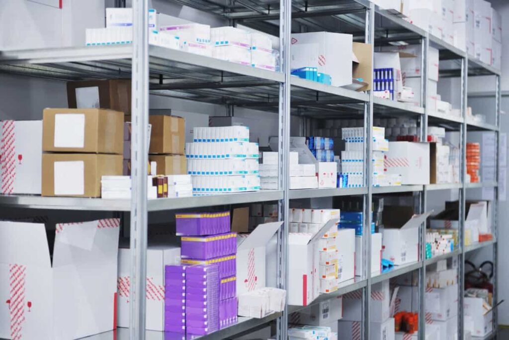 A pharmacy with shelves full of various types of medicine.