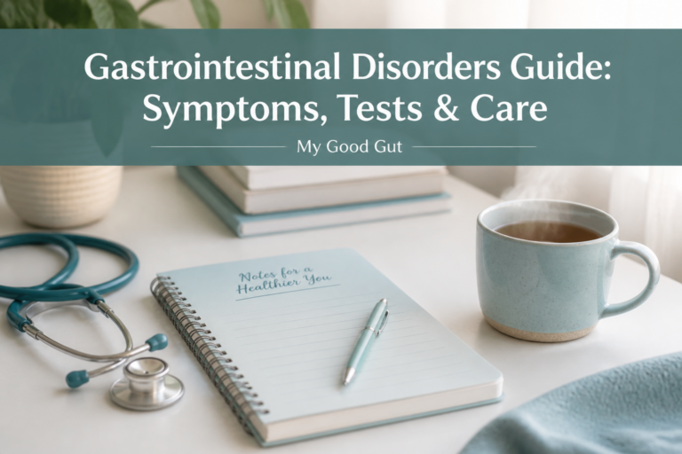 A notebook labeled "Notes for a Healthier You," a stethoscope, pen, and cup of tea rest on a desk, with "Gastrointestinal Disorders Guide: Symptoms, Tests & Care – My Good Gut" displayed above.