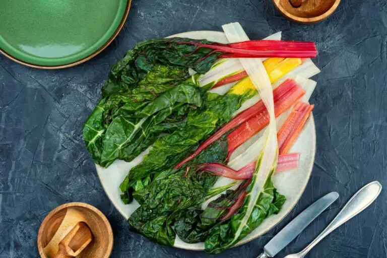 A plate of swiss chard and radishes, perfect for those with ibs and looking for cooked vegetables to enjoy.